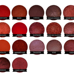 Side view of 10 stacked 5g eyeshadow jars showing varied metallic and matte shades in circular compacts