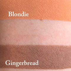 Close-up of warm gingerbread matte eyeshadow pan showing rich pigmentation and smooth powder texture