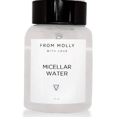Micellar water bottle with black cap and white label, From Molly With Love brand visible