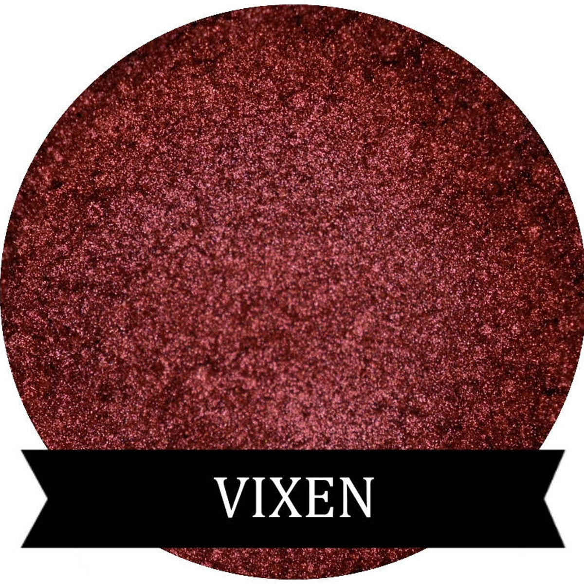 Vixen metallic red eye shadow pot with reflective finish and sleek black compact.