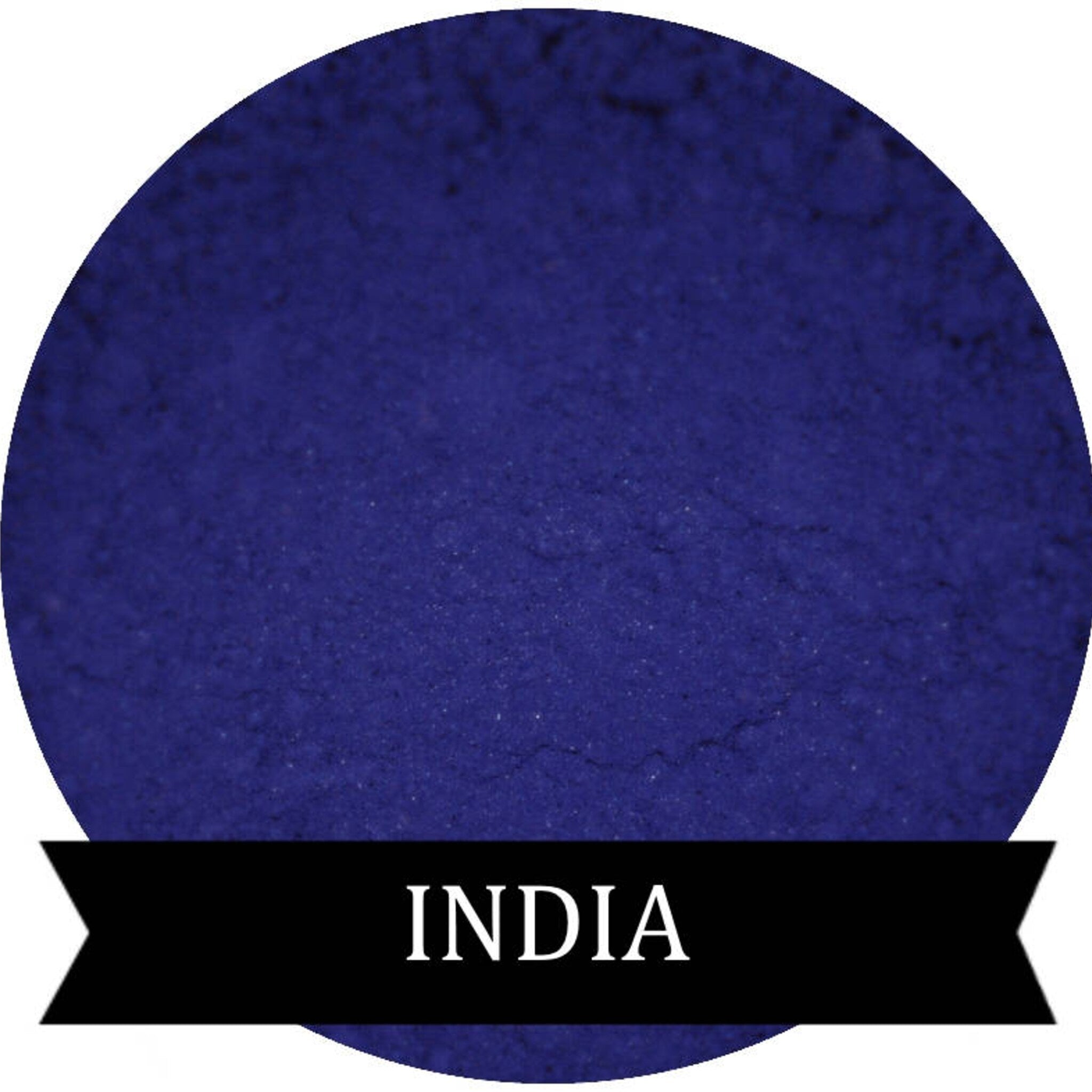 Indigo matte mineral eyeshadow in compact case with smooth powder surface and subtle sheen