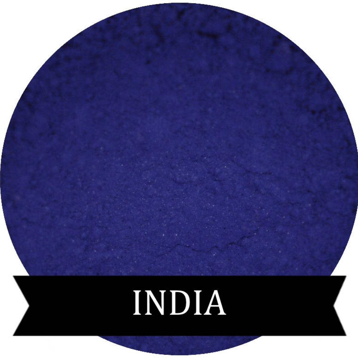 Indigo matte mineral eyeshadow in compact case with smooth powder surface and subtle sheen