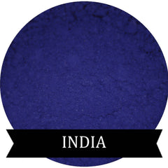 Indigo matte mineral eyeshadow in compact case with smooth powder surface and subtle sheen