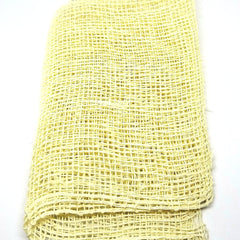 Natural agave cactus fiber exfoliating washcloth with textured weave on bamboo hook, beige tones, eco-luxury skincare accessory