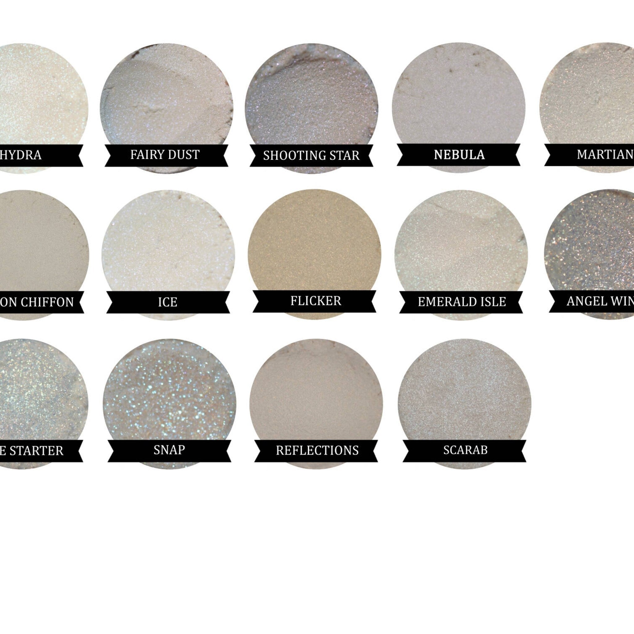 Scarab Green Iridescent Eyeshadow compact with gold detailing and mirrored interior, displayed open on marble surface.