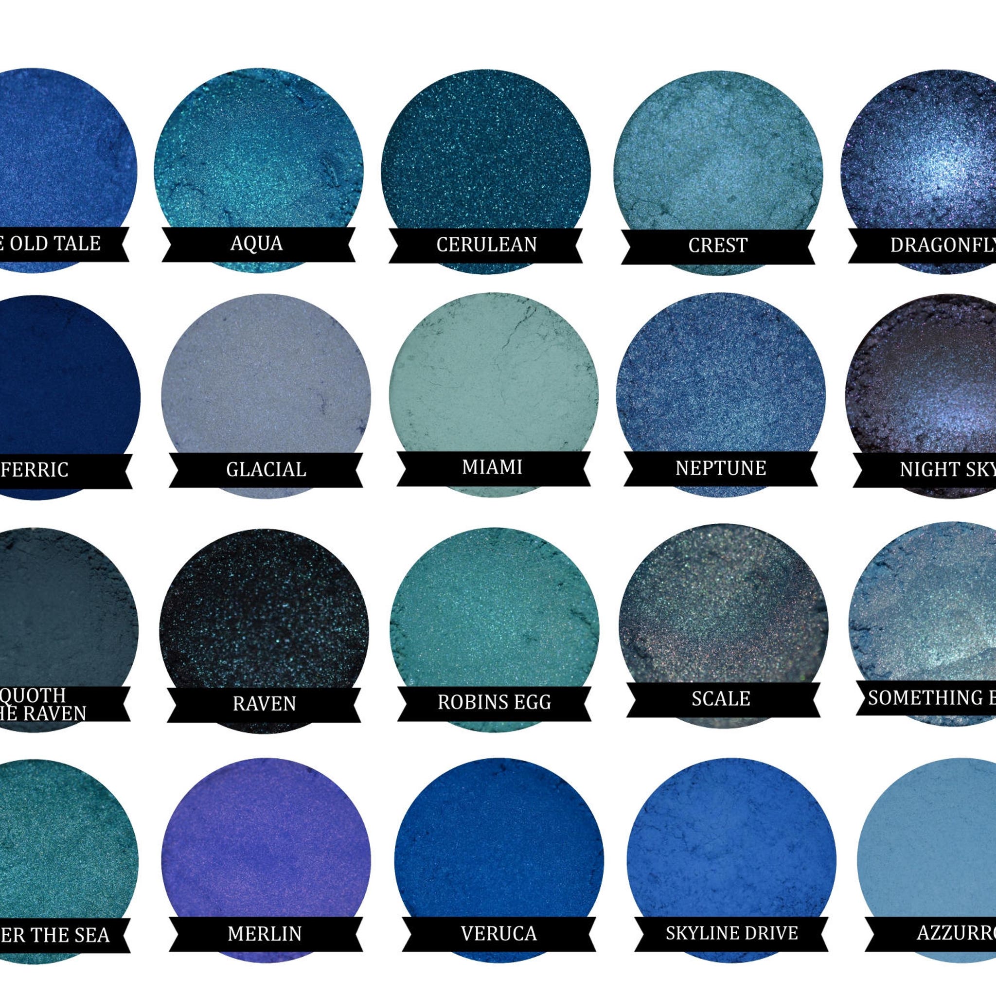 Eyeshadow shades in blue, teal, and gray with name labels on black banners, round shape