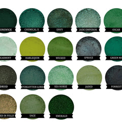 Eyeshadow swatches, green and shimmery, with text labels on black banners, various shades