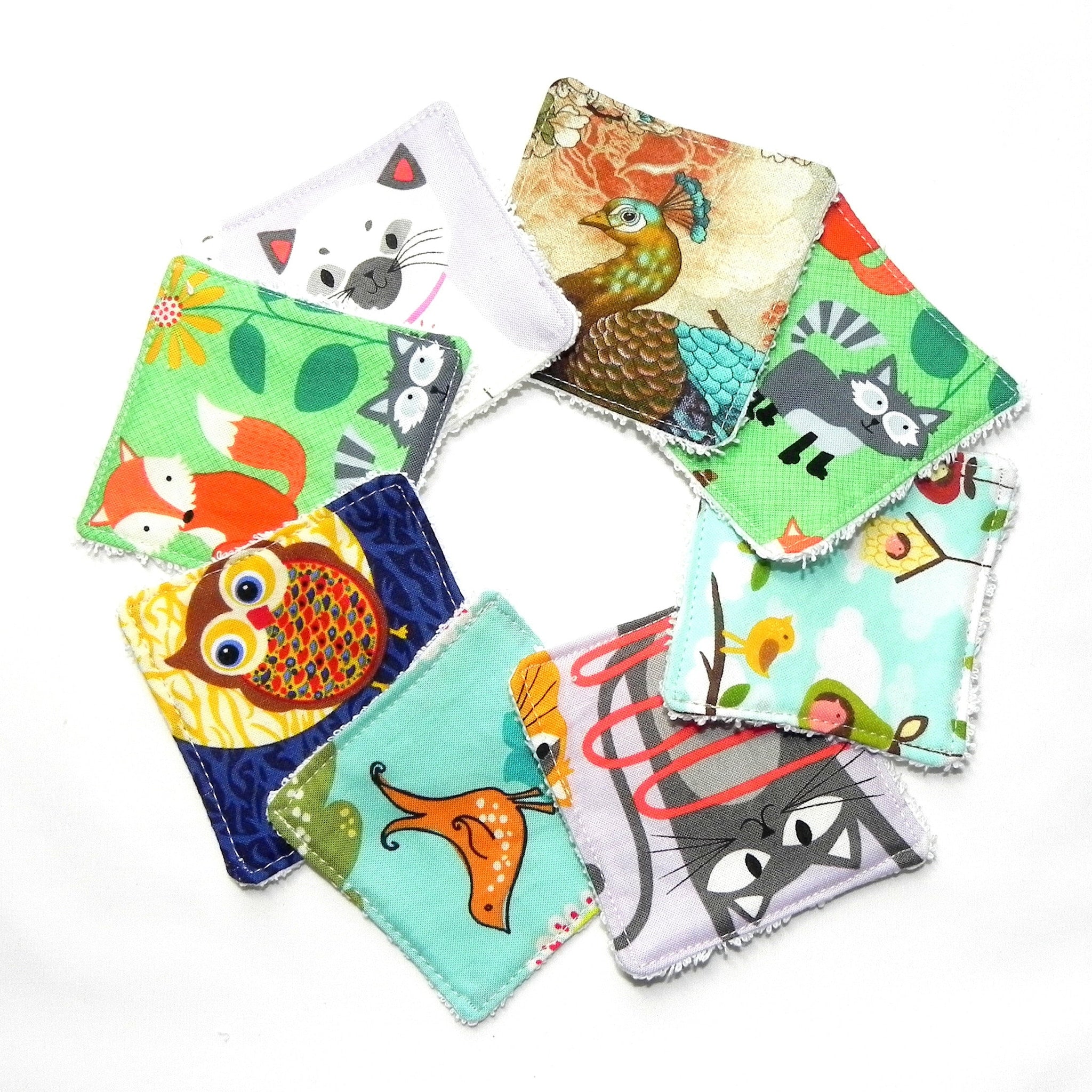 Cloth squares with animal patterns in various colors and styles, arranged in a circle