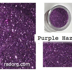 Vibrant purple glitter eyeshadow palette with shimmer particles in a sleek compact case