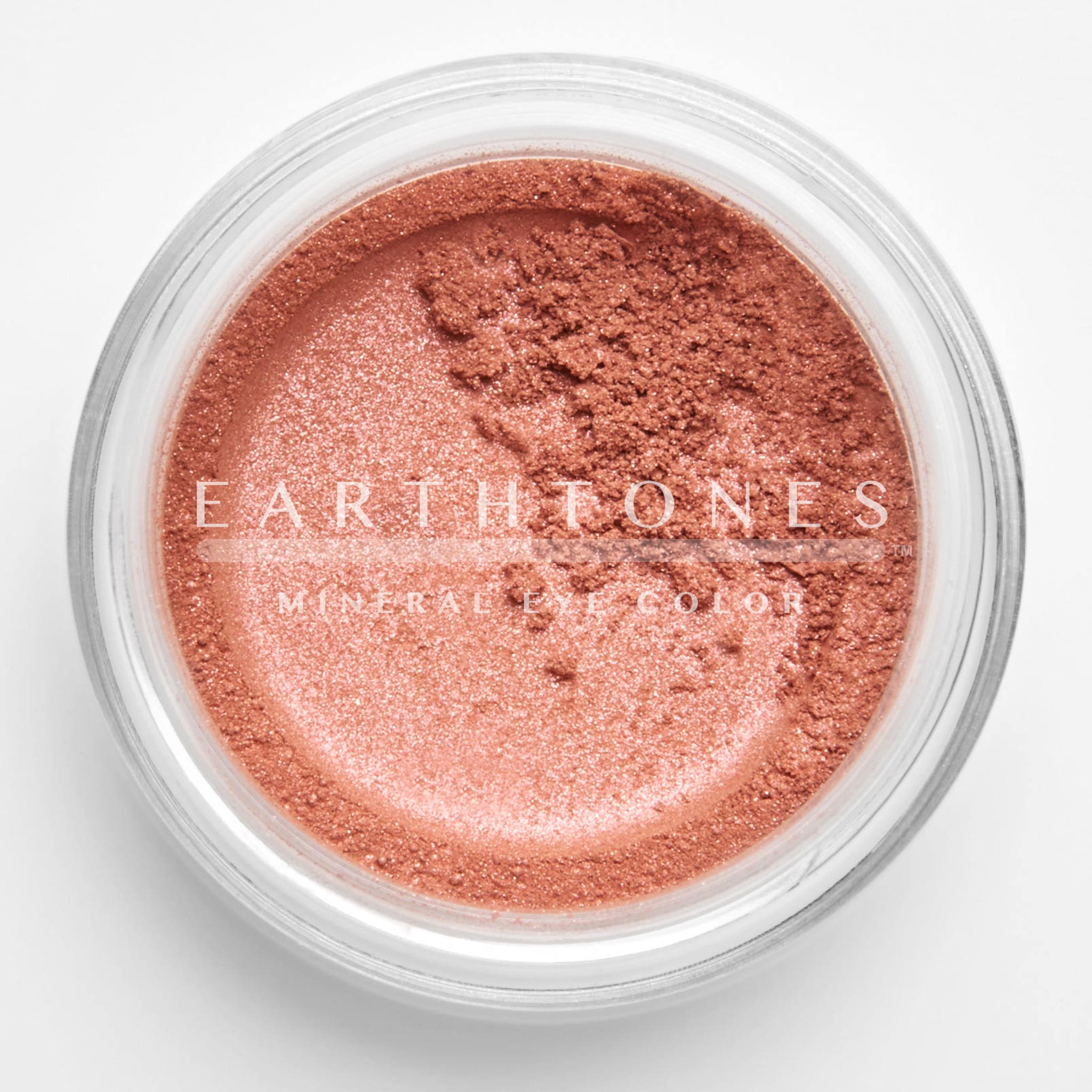 Close-up of Rose Sparkle Mineral Eye Shadow in a compact with shimmering pink and gold tones