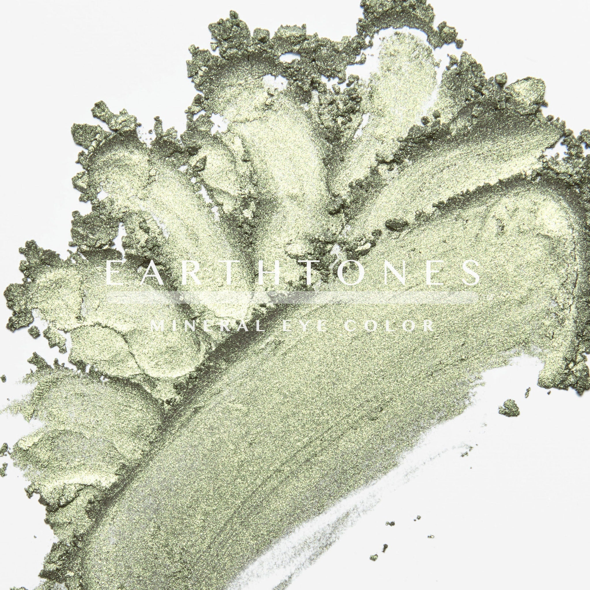 Open compact showing mint green shimmer eye shadow with soft reflective particles