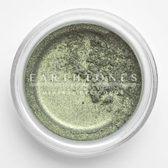 Close-up of mint green shimmer mineral eye shadow with soft metallic finish in round compact