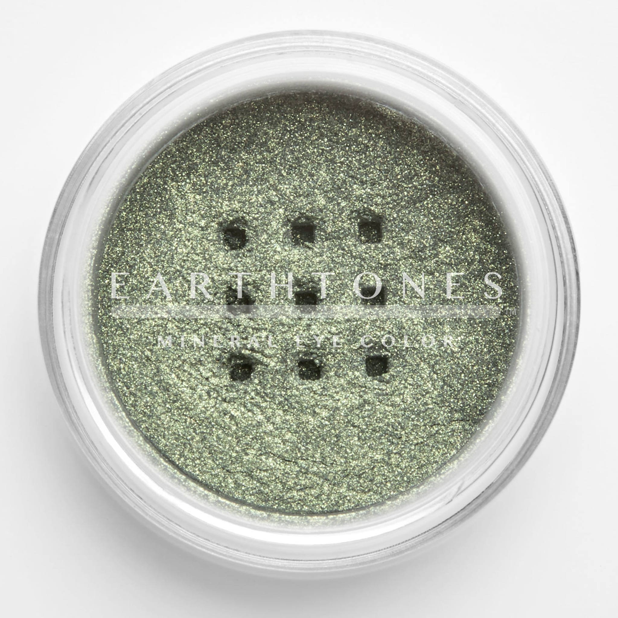 Side view of mint green shimmer mineral eye shadow pot showing reflective metallic finish
