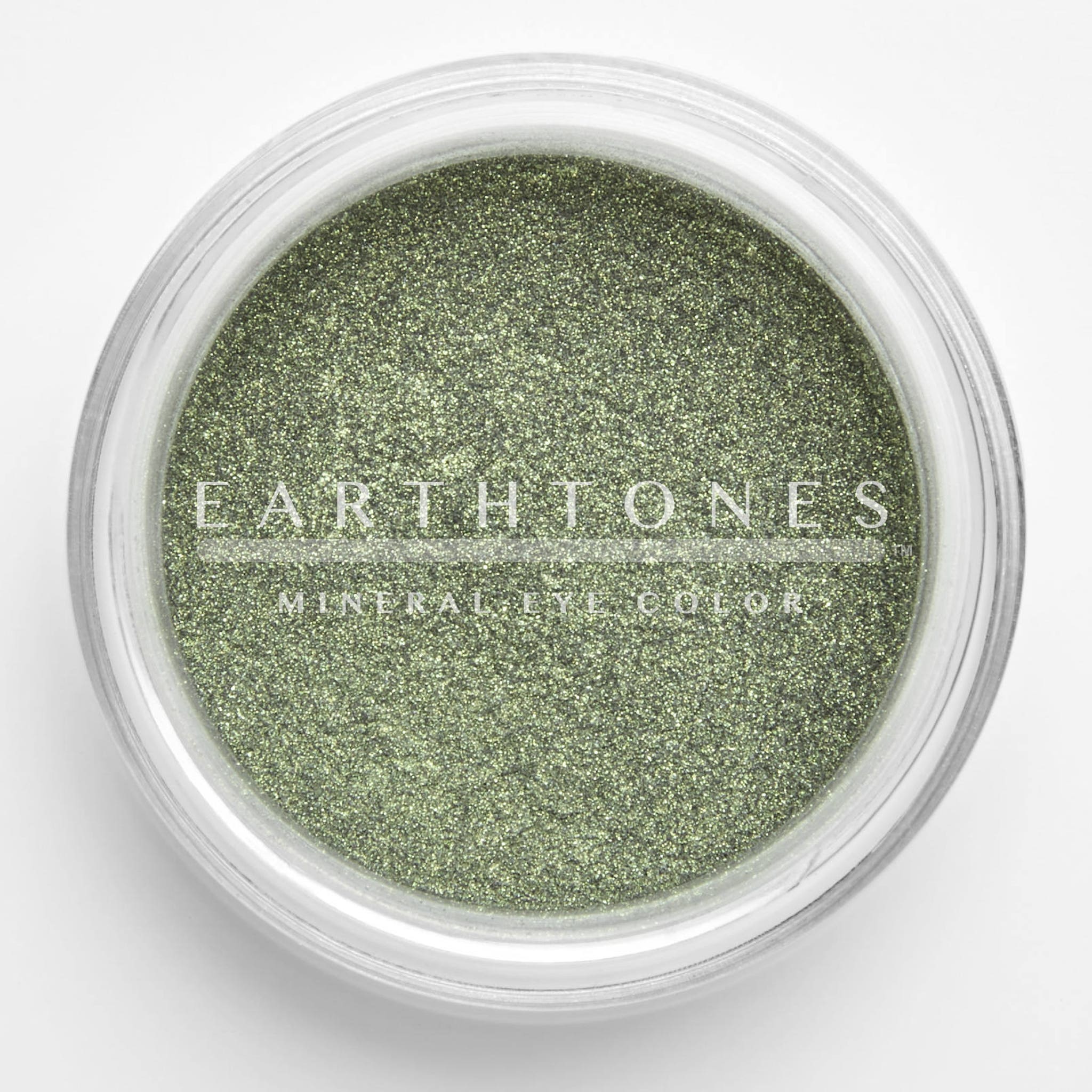 Close-up of mint green shimmer mineral eye shadow with soft reflective sparkle and smooth powdery texture
