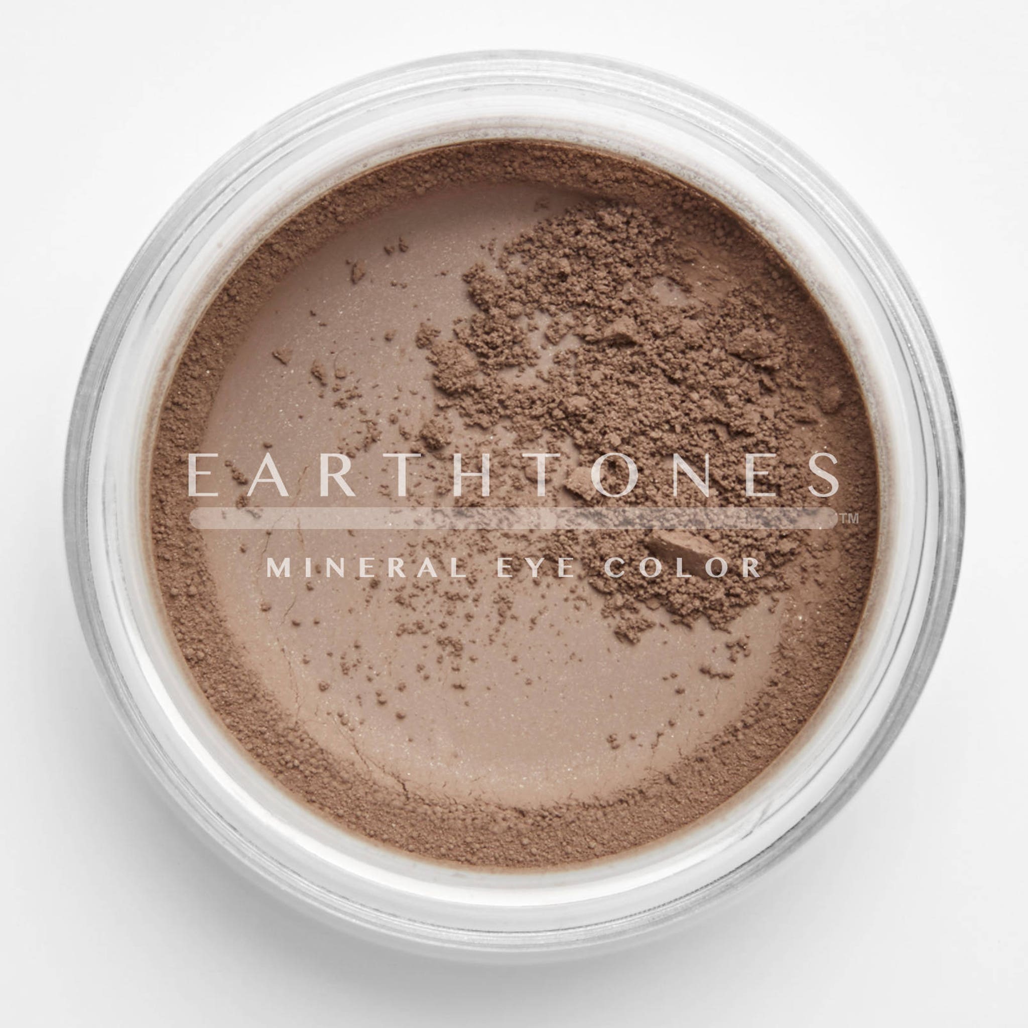 Mineral eye shadow pot in rich chocolate brown with smooth matte finish and round compact design