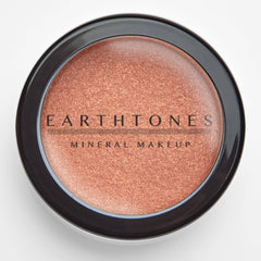 Side view of Copper Glow Mineral Eye Shadow pot showcasing rich metallic copper pigment and smooth powder texture