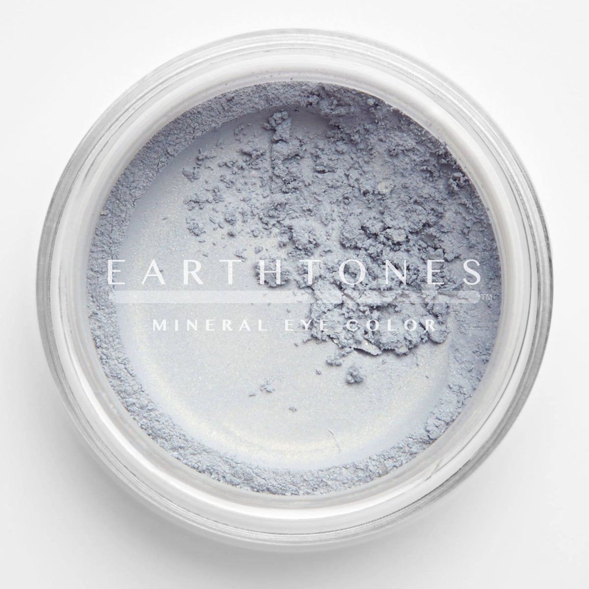 Close-up of Cloud Mineral Eye Shadow in a compact case with smooth matte finish and soft shimmer pigment.