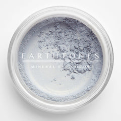 Close-up of Cloud Mineral Eye Shadow in a compact case with smooth matte finish and soft shimmer pigment.