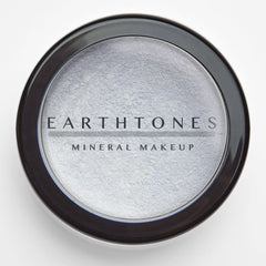 Side view of Cloud Mineral Eye Shadow compact showing pressed powder texture and soft matte finish in neutral tones