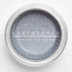 Silver mineral eye shadow in compact case with smooth metallic finish and shimmering pigment.
