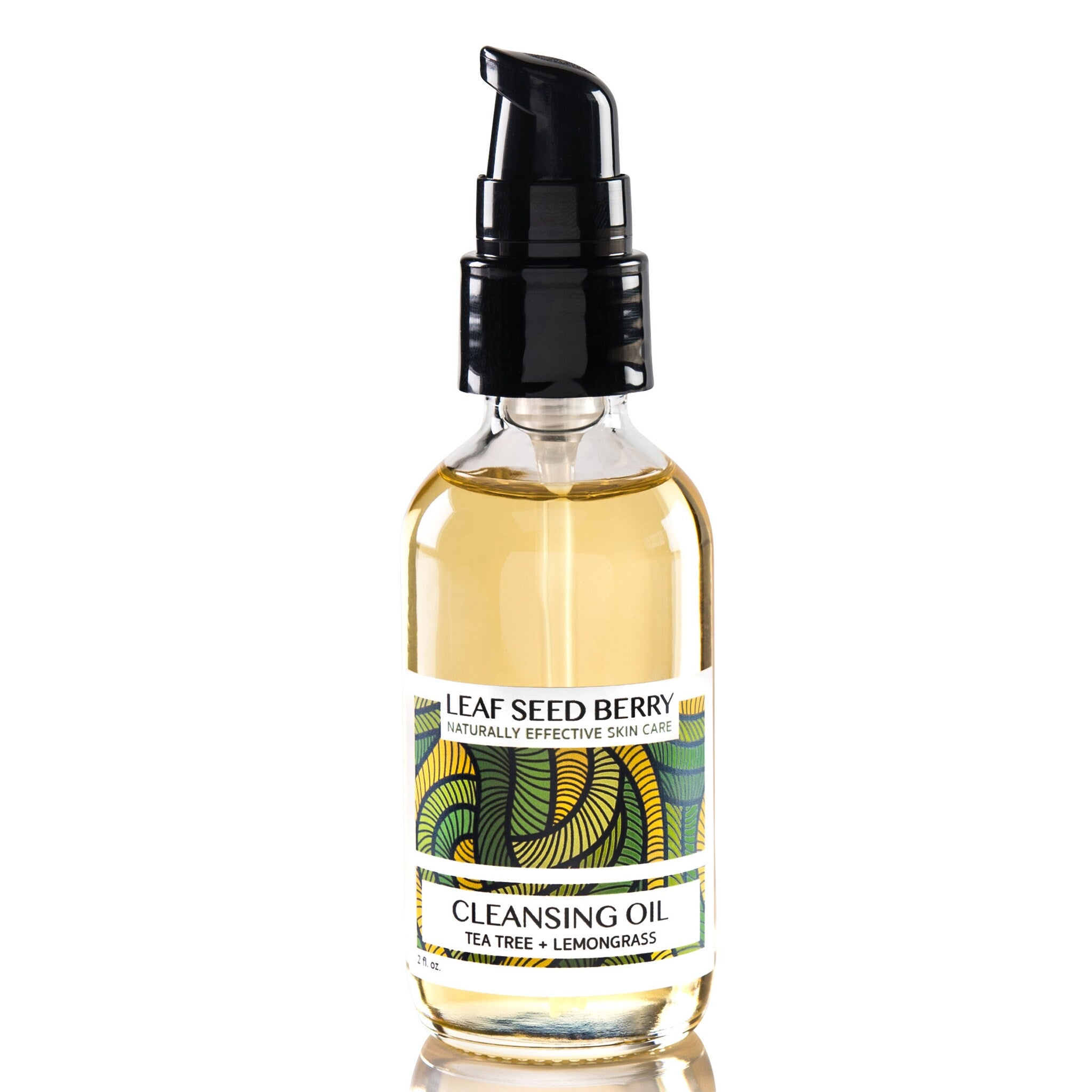Facial Cleanser bottle with black pump, clear glass, and Leaf Seed Berry label