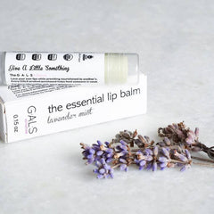 Lip balm tube with white packaging, lavender sprig, GALS brand name visible