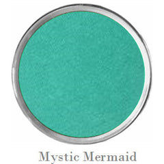 Close-up of sparkly black and teal eyeshadows with shimmer particles in vegan mermaid palette