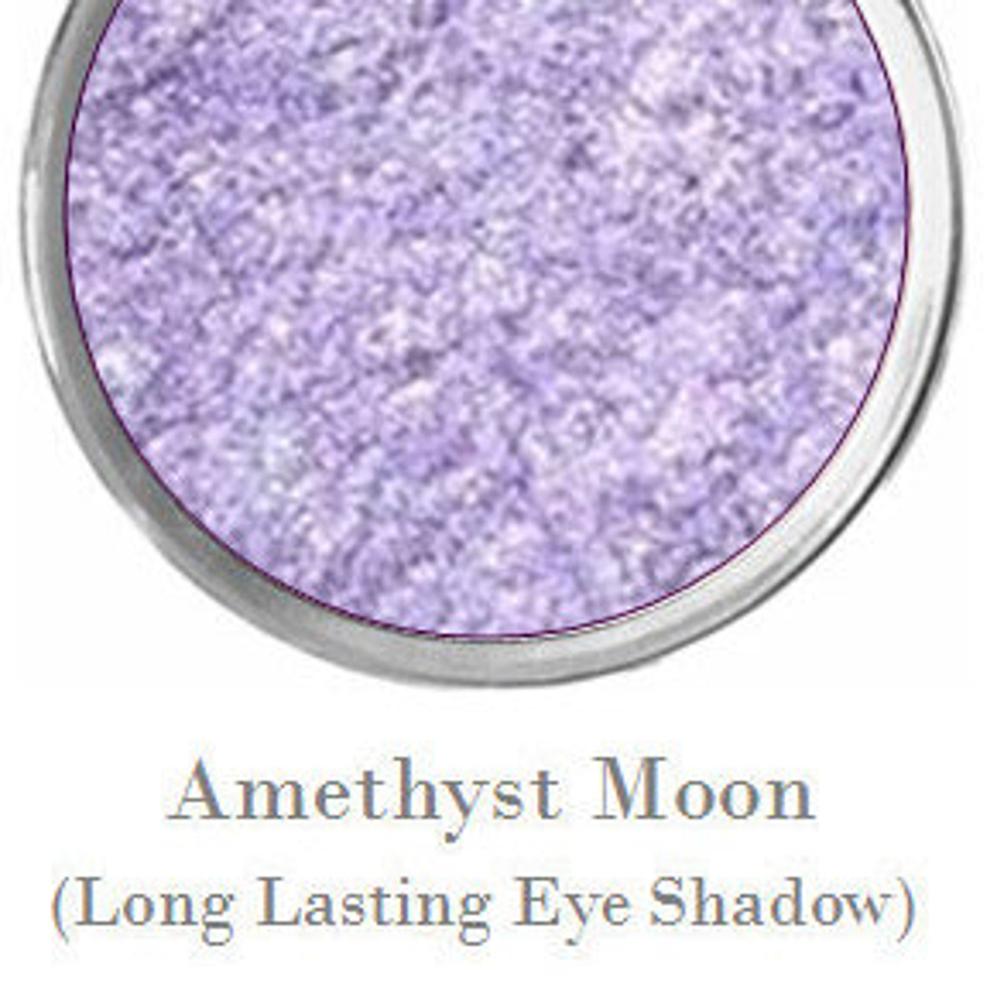 Side view of Amethyst Moon pastel lavender eye shadow pan showing soft matte texture and compact size