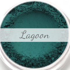 Matte teal eyeshadow sample with "Lagoon" text, teal powder in a jar