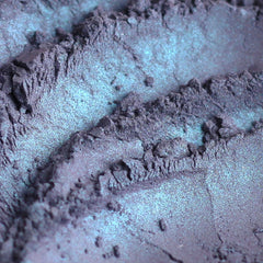 Powder eyeshadow, iridescent blue and purple, with textured surface