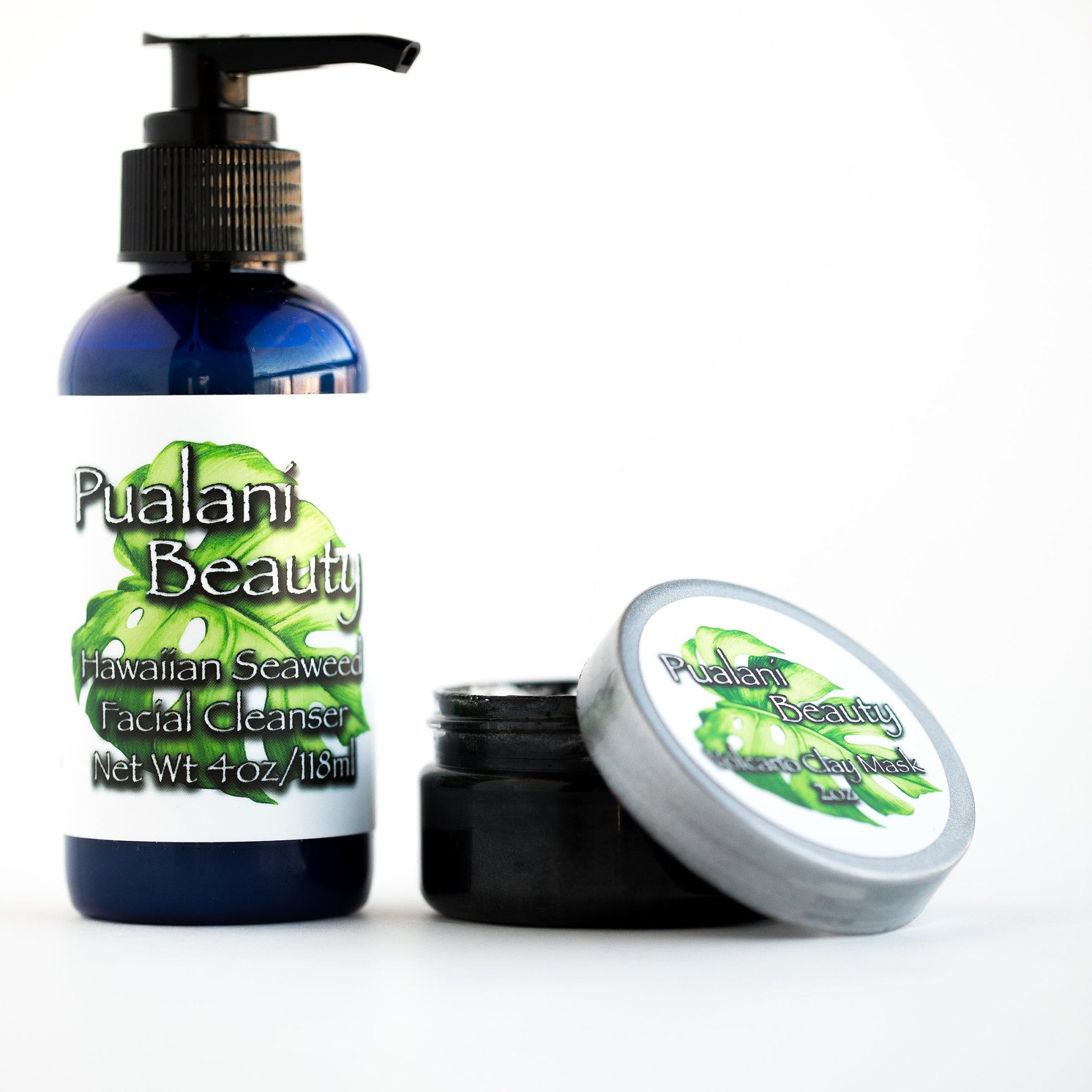 Facial cleanser and mask set with blue, black, and silver containers, Pualani Beauty label
