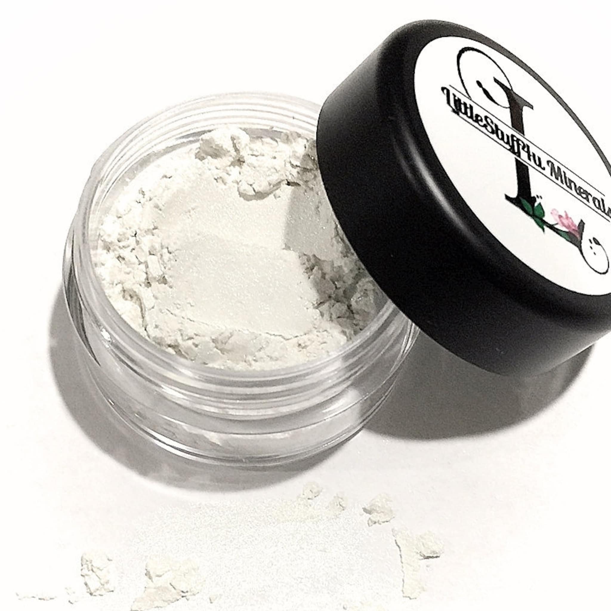 Mineral powder in clear jar with black lid, white powder, and "LittleStuff4u Minerals" text