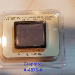 Close-up of matte pink and shimmering gray eye shadow pans with embossed logo in compact palette