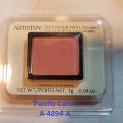 Side view of seven discontinued gray and pink powder eye shadows in sleek rectangular compacts with embossed logos