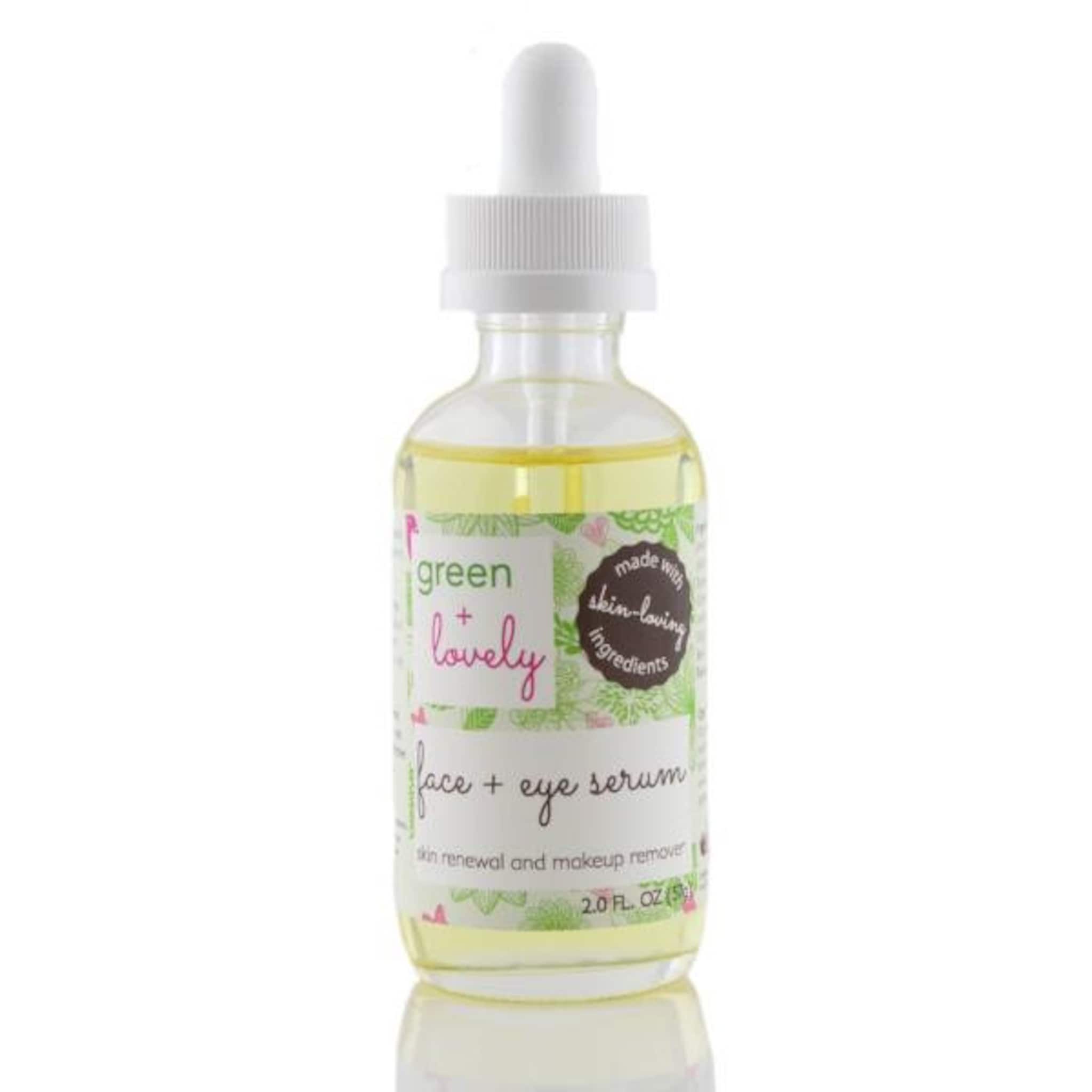 Face serum bottle with clear glass, yellow liquid, and white dropper top, "green + lovely" label