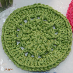 Crochet circle green yarn, handmade, openwork pattern, close up