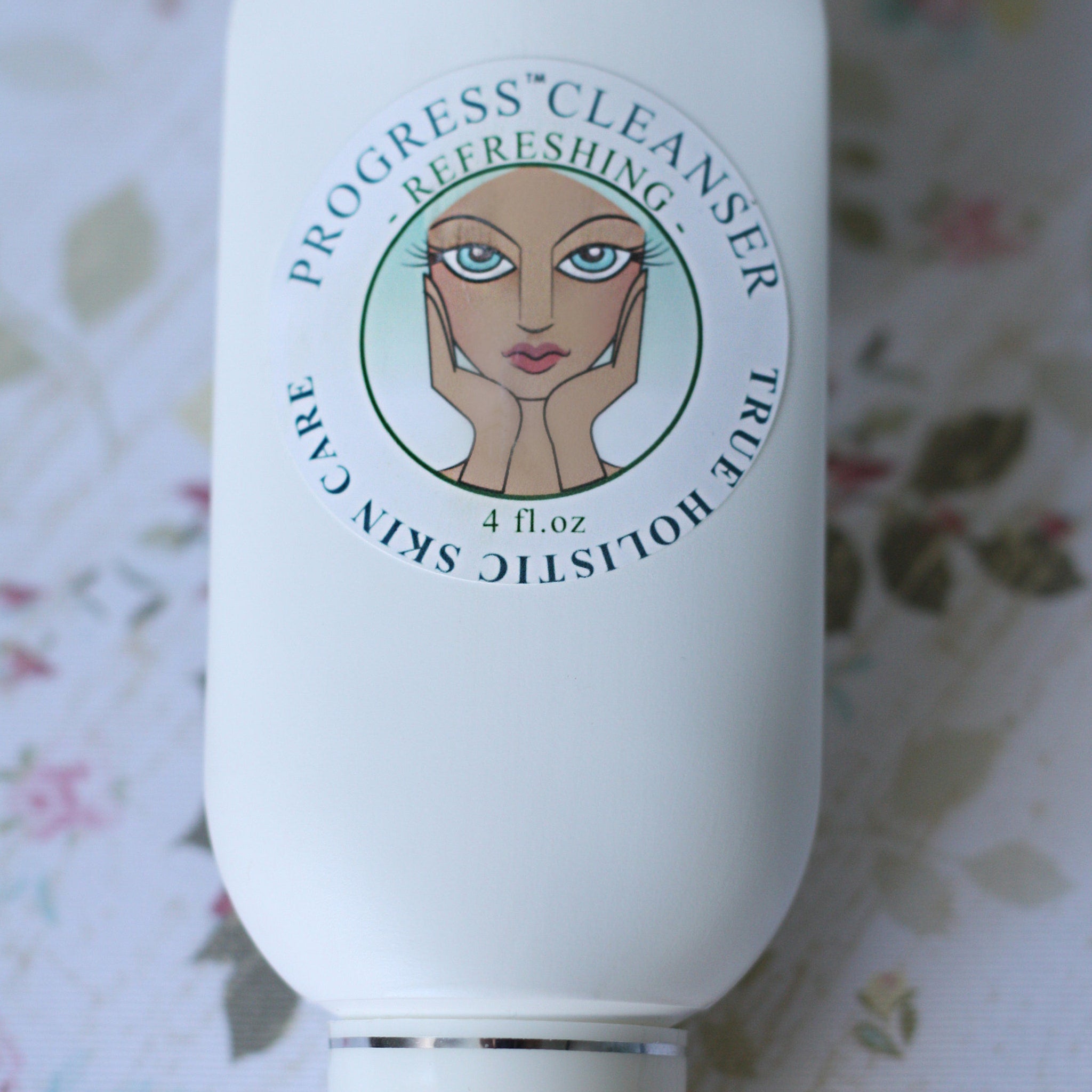 Cleanser bottle, white bottle with Progress Cleanser label, illustration of face, 4 fl oz size