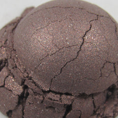 Side view of EPHEMERA loose powder eyeshadow duo in shimmering cool mauve and chocolate brown shades