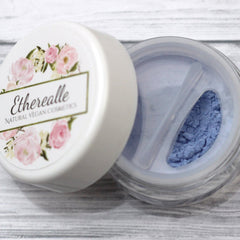 Blue duochrome mineral eyeshadow in compact with shimmer finish and vegan label