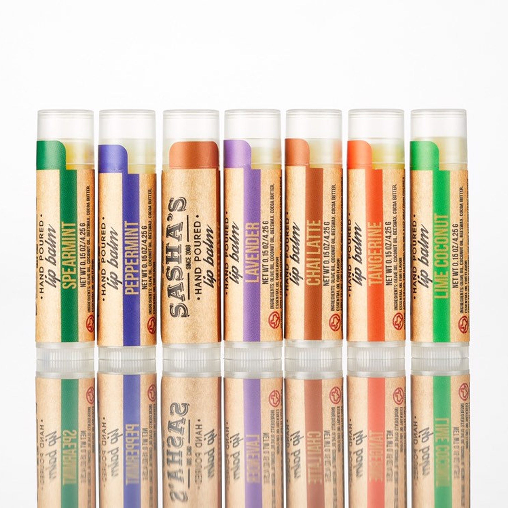 Lip balm tubes with green, purple, orange, and brown labels, Sasha's brand text visible