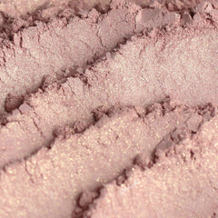 Close-up of Heiress vegan mineral eyeshadow in light golden pink with soft shimmer finish