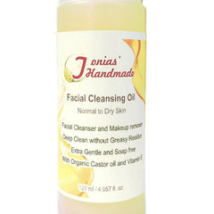 Facial Cleansing Oil bottle with yellow liquid, white label, and Tonias' Handmade text