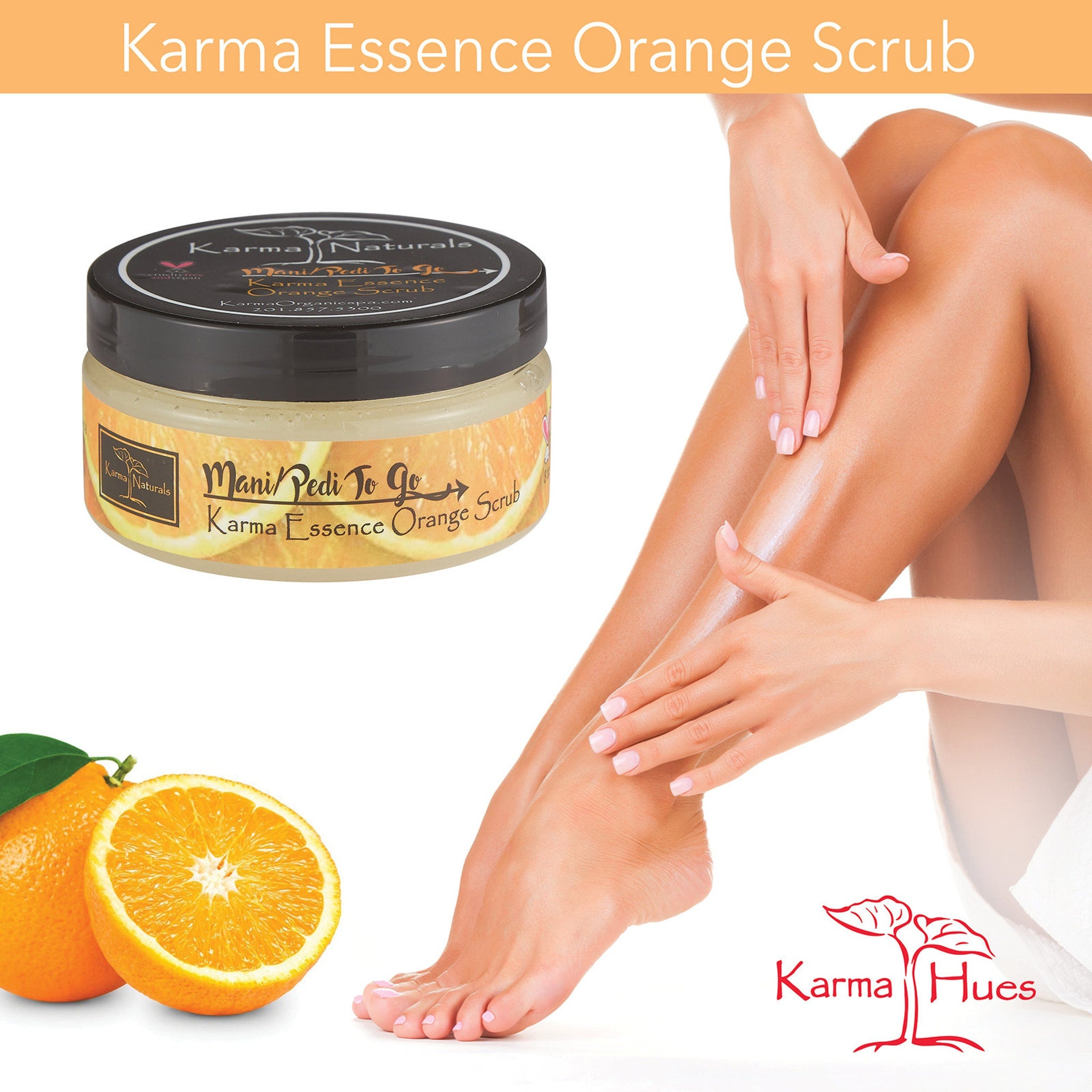 Orange scrub jar with orange slices, being applied to legs, Karma Naturals brand visible