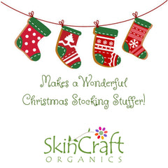 Christmas stockings hanging, red and green with white patterns, SkinCraft Organics branding