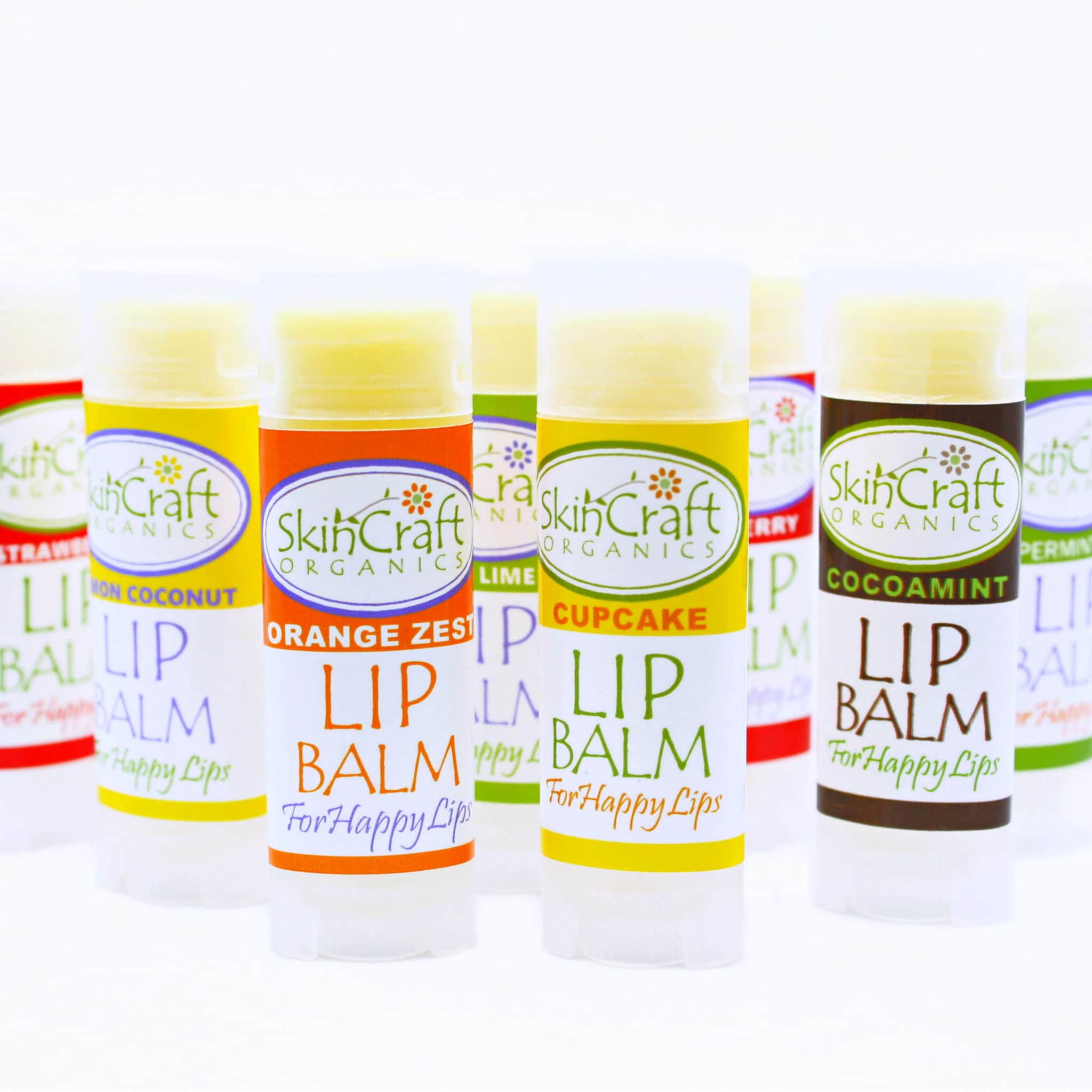 Lip balm tubes with colorful labels, SkinCraft brand, for happy lips