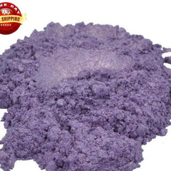 Close-up of amethyst purple mica powder in a sleek glass jar with gold lid, shimmering under light