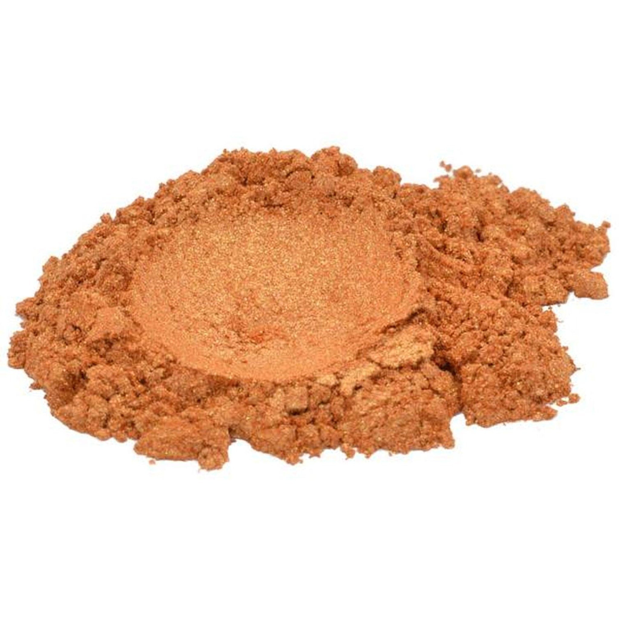 Swatch of LOVELY LEO eyeshadow powder showing vibrant orange-yellow rose mica blend on skin