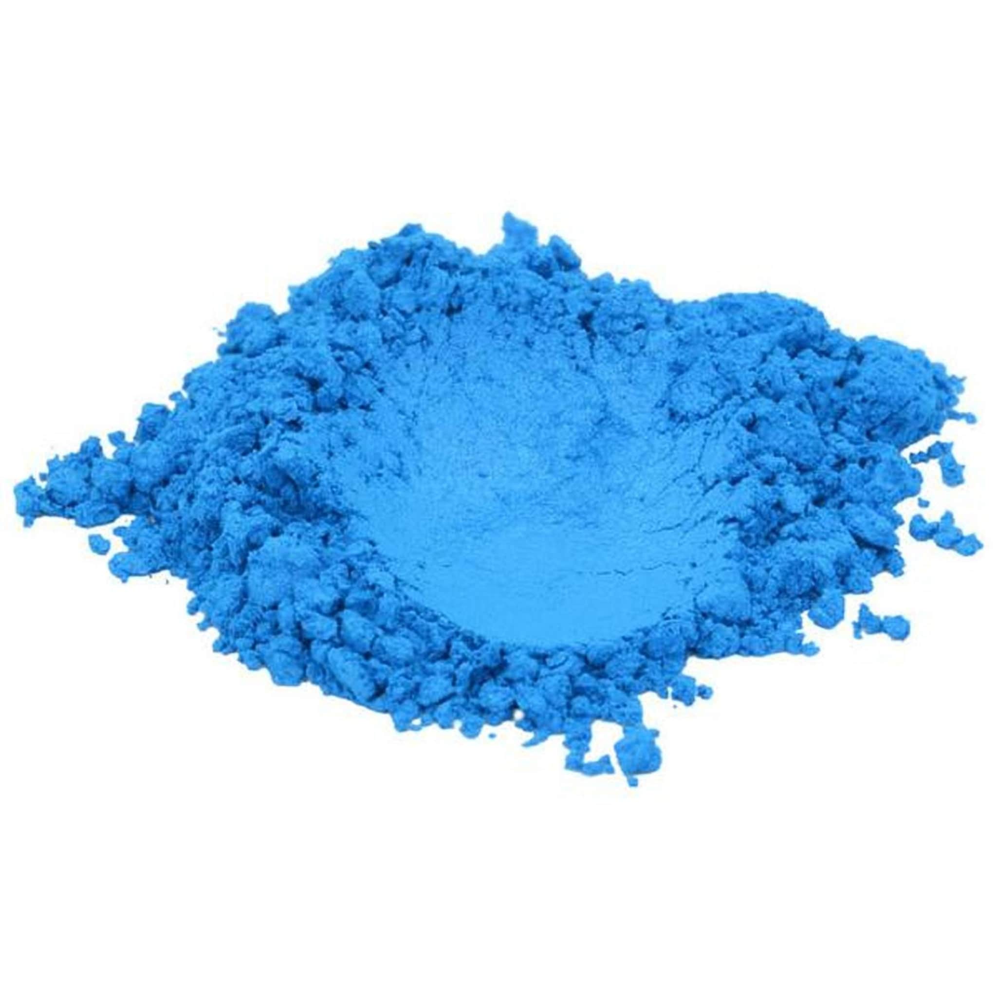 Side view of True Blue mica pigment powder in a sleek cylindrical jar with silver lid, showcasing vibrant cobalt hue.