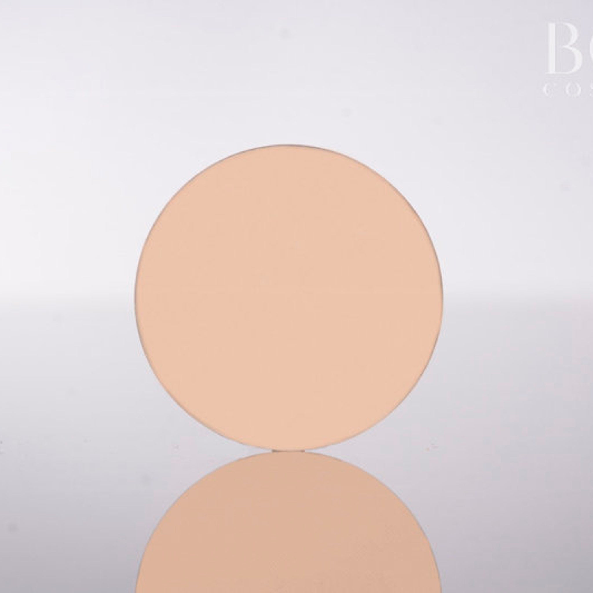 Single matte eyeshadow pan in soft pink and beige shades with smooth pressed powder finish
