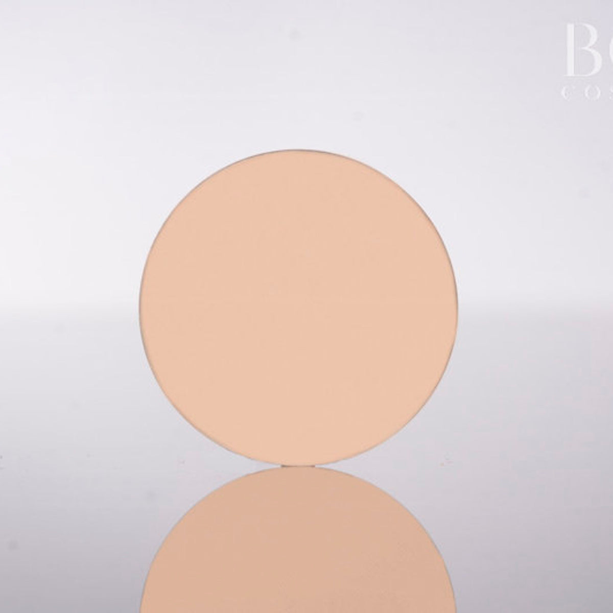 Single matte eyeshadow pan in soft pink and beige shades with smooth pressed powder finish